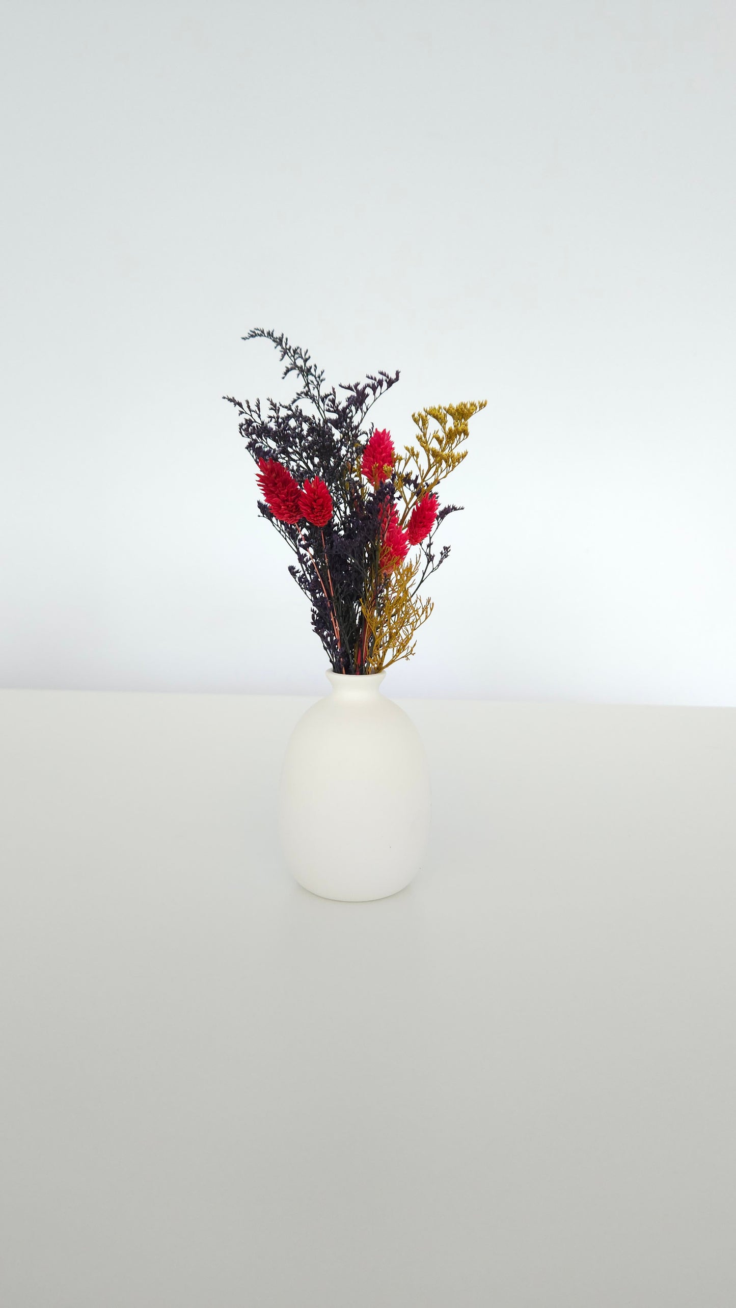 Vase with dried flowers